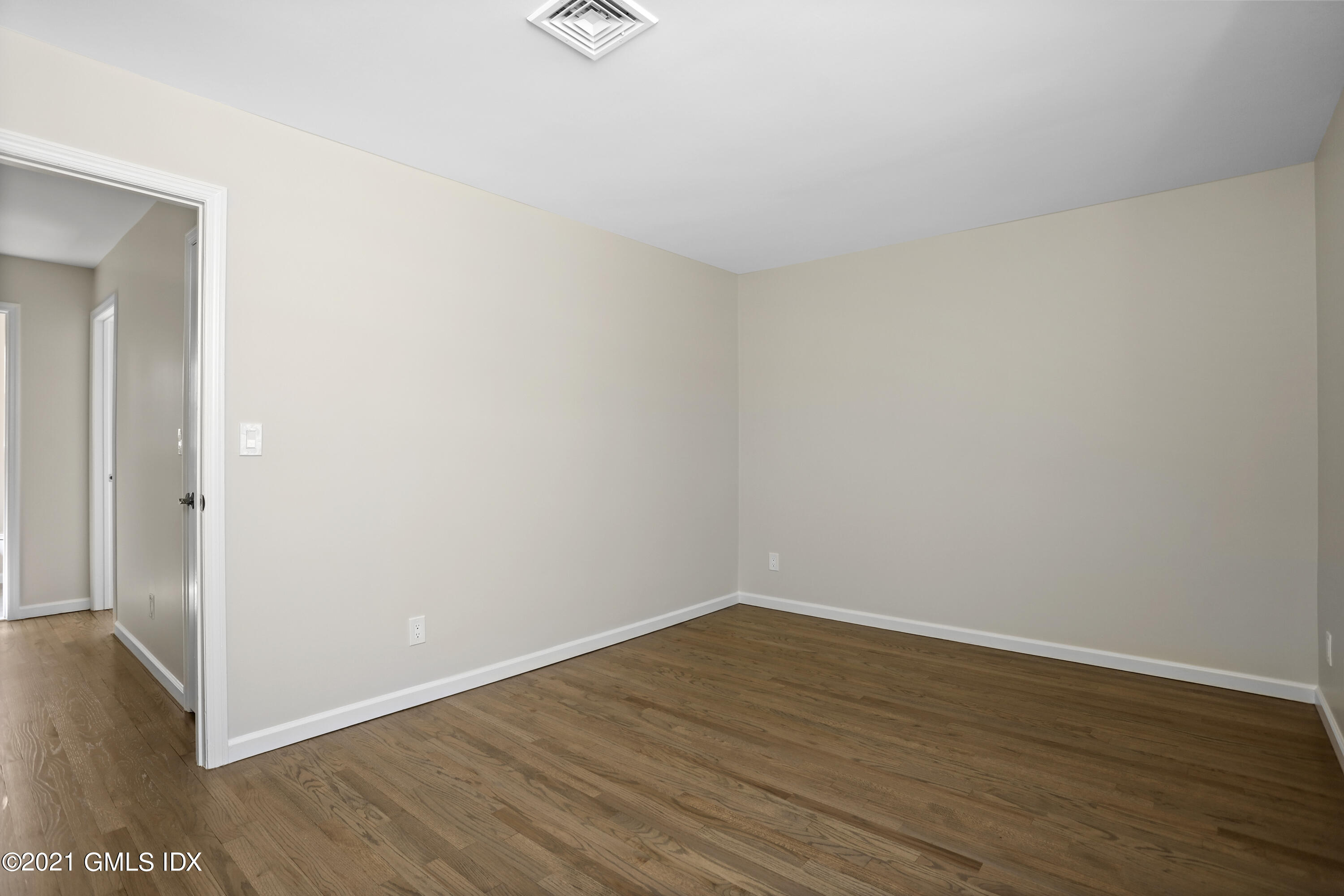 36 Decatur Street, Unit 2 Cos Cob, CT 06807 - Photo 18 of 30 a view of an empty room with wooden floor