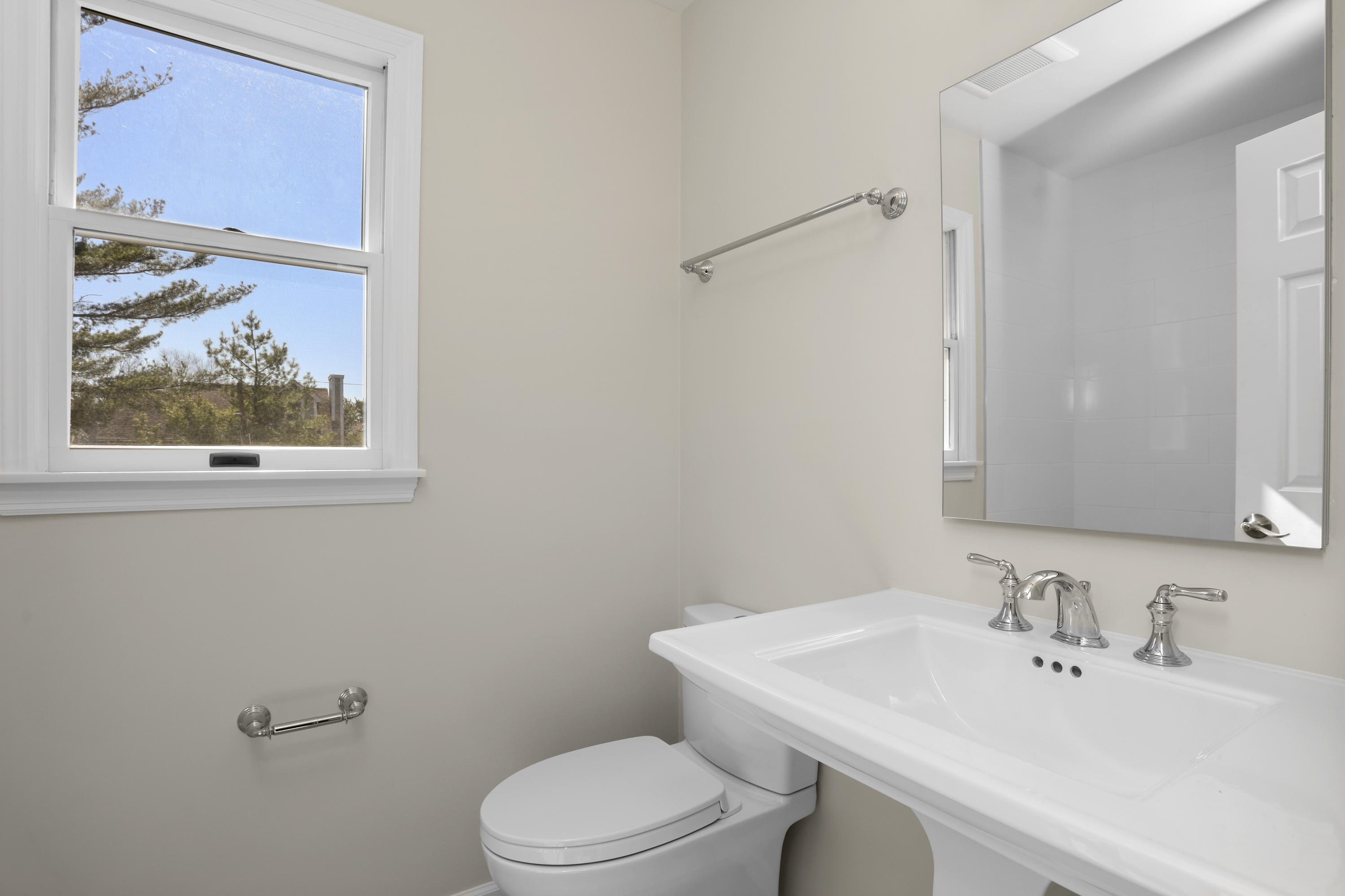 36 Decatur Street, Unit 2 Cos Cob, CT 06807 - Photo 19 of 30 a bathroom with a sink mirror and toilet
