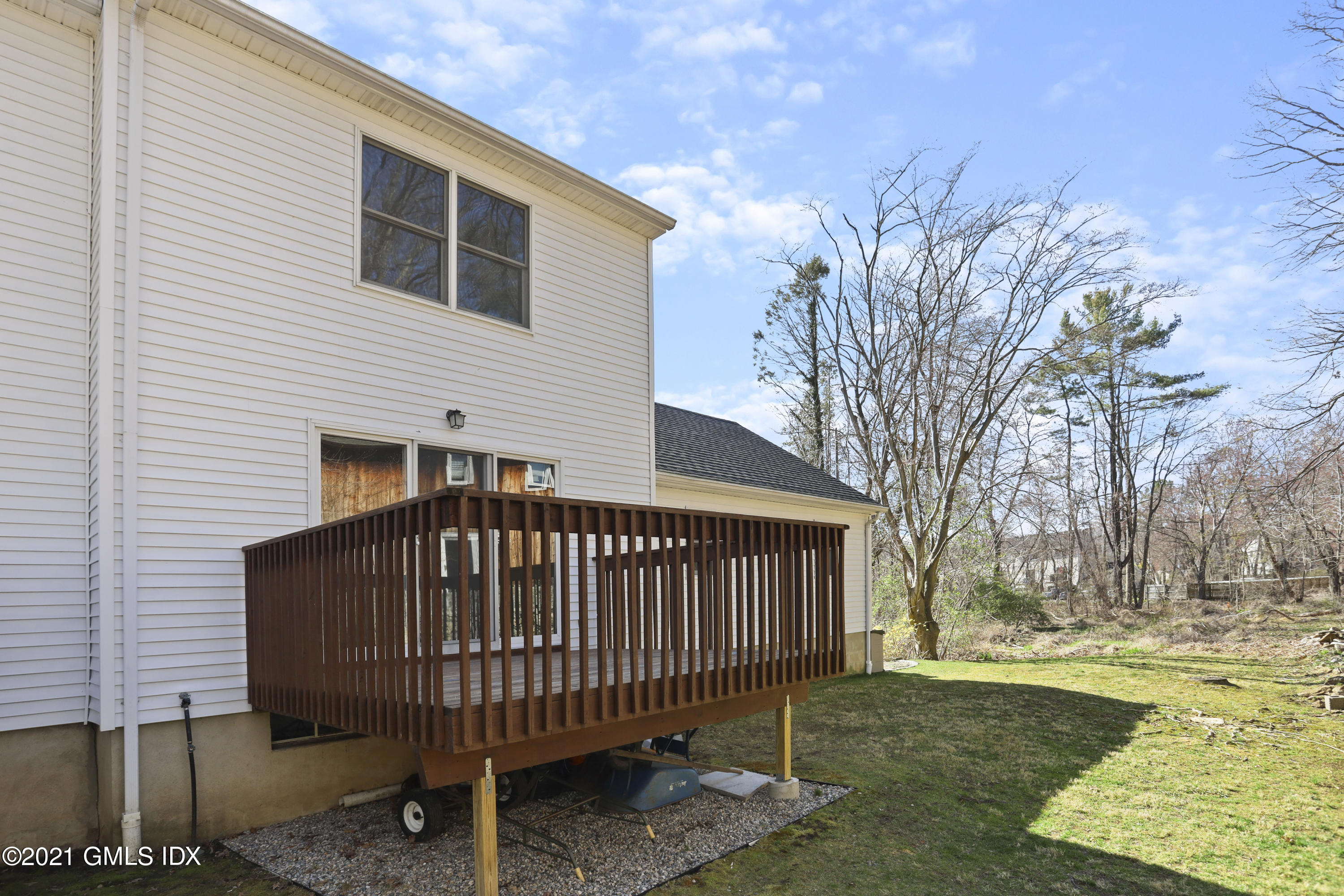 36 Decatur Street, Unit 2 Cos Cob, CT 06807 - Photo 26 of 30 a view of a house with a yard and deck