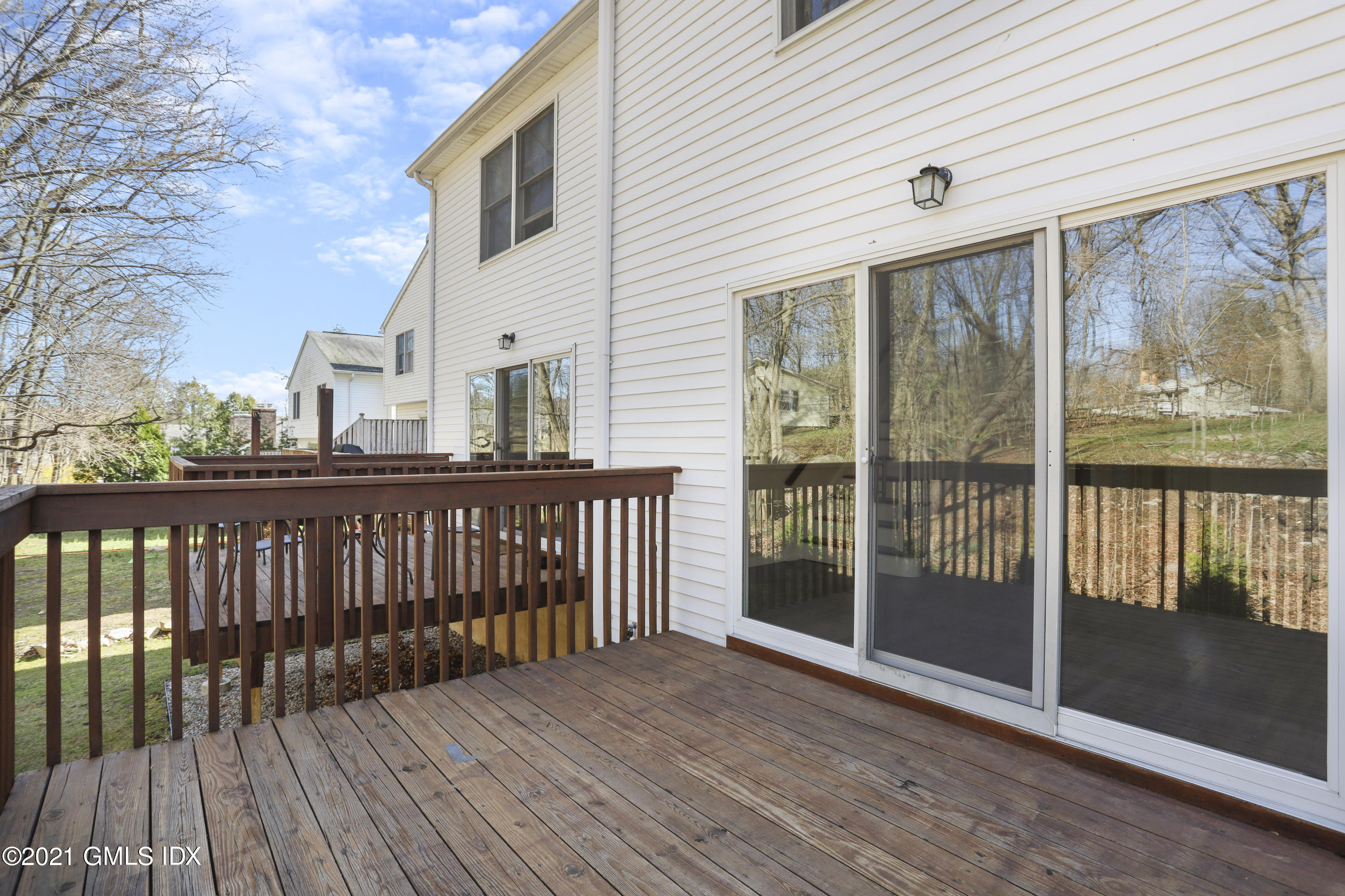 36 Decatur Street, Unit 2 Cos Cob, CT 06807 - Photo 28 of 30 a view of a balcony with wooden floor