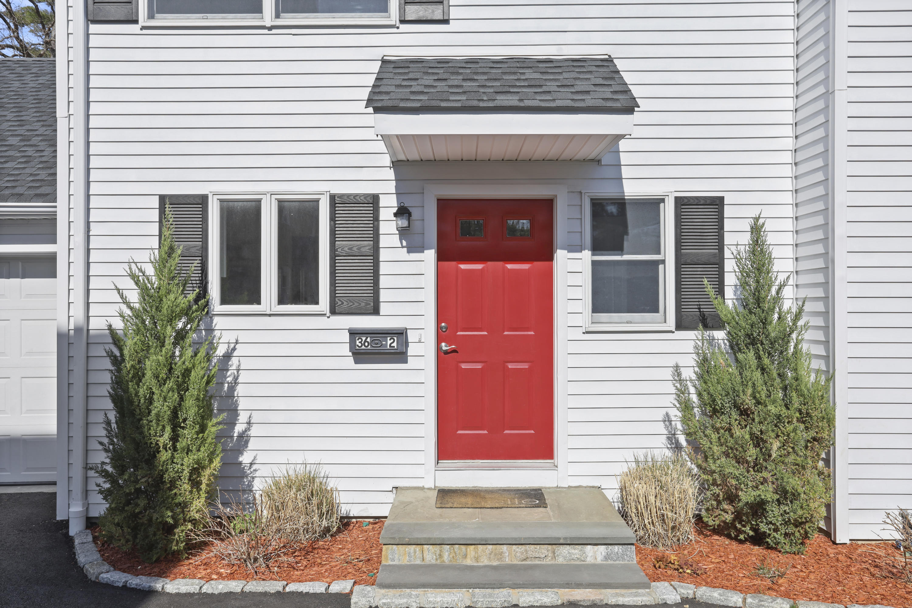 36 Decatur Street, Unit 2 Cos Cob, CT 06807 - Photo 3 of 30 a front view of a house with a yard