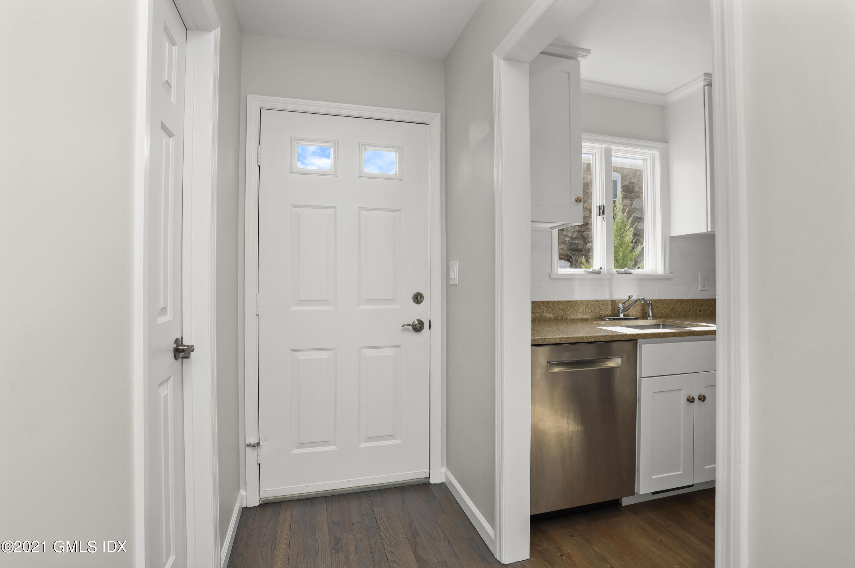 36 Decatur Street, Unit 2 Cos Cob, CT 06807 - Photo 4 of 30 a bathroom with a sink and a mirror