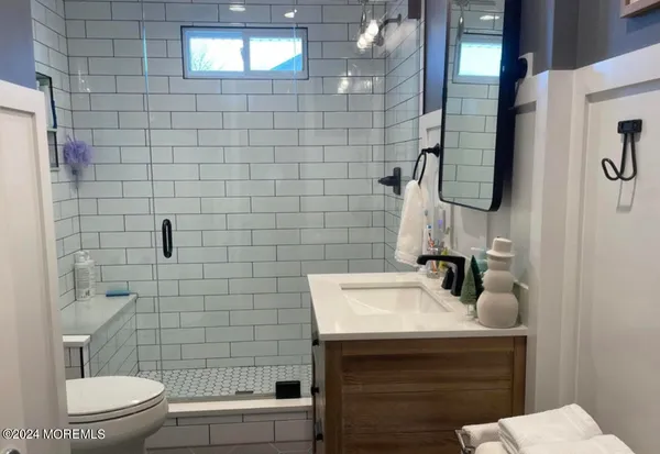 a kitchen with a stove and a microwave