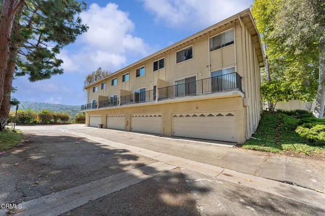 a view of a house with a garden