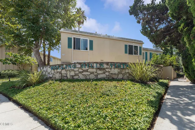 a view of swimming pool with a yard