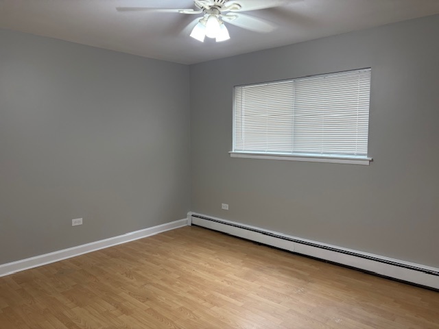 8923 Knight Avenue, Unit 201 Des Plaines, IL 60016 - Photo 13 of 13 an empty room with a window