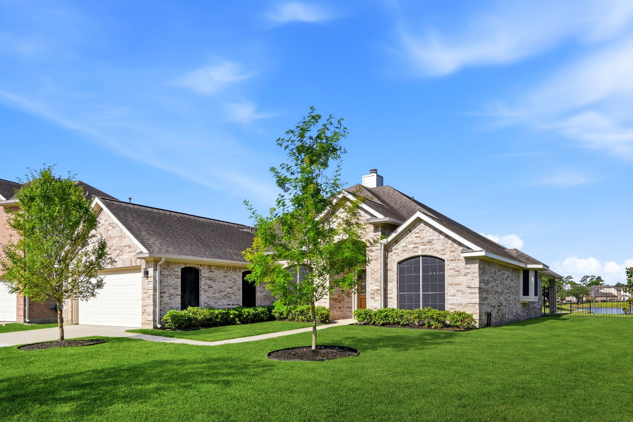 29819 South Legends Village Circle Spring, TX 77386 - Photo 6 of 48 a front view of a house with a yard and trees