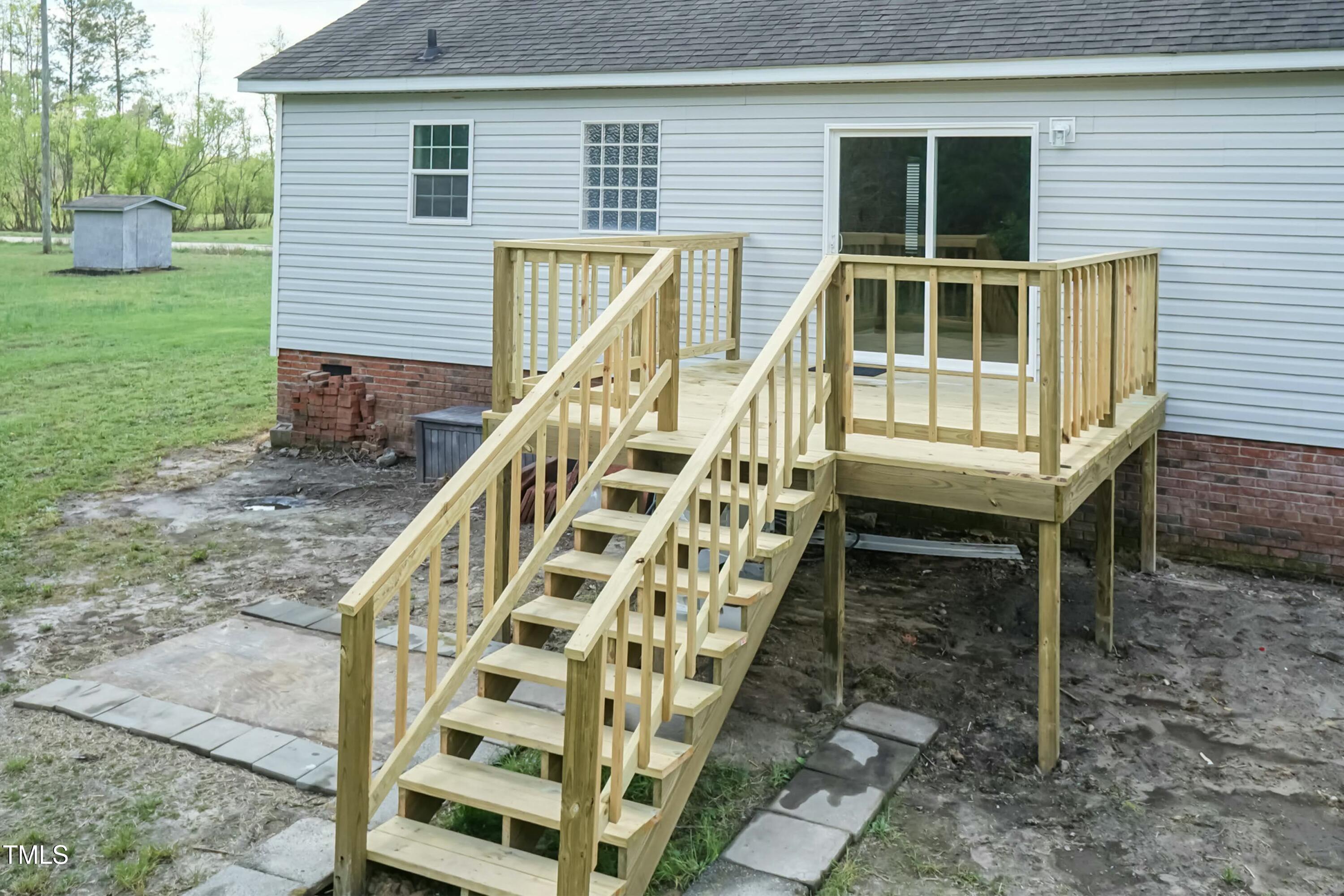 660 Our Way Linden, NC 28356 - Photo 30 of 36 a front view of a house with a yard