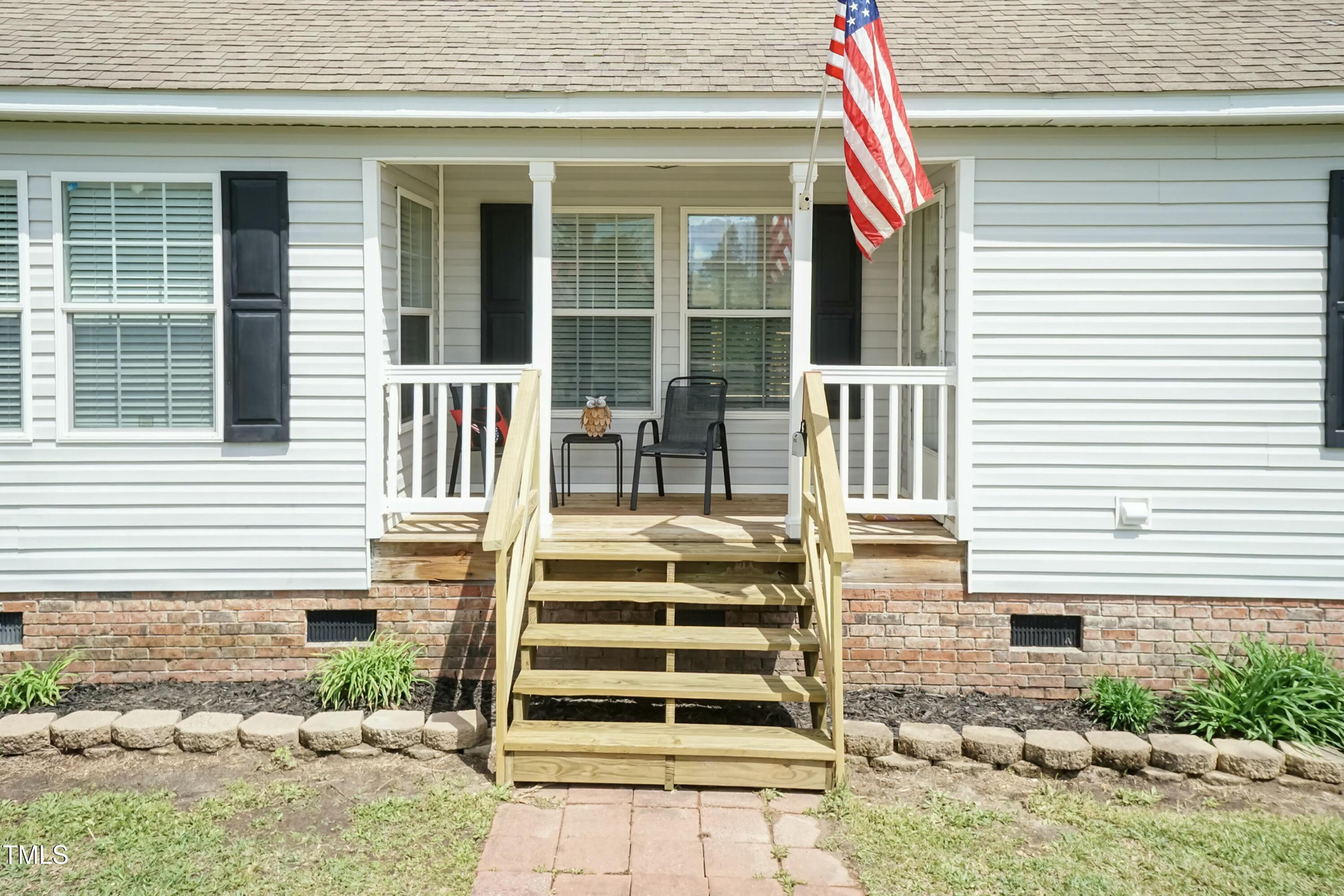 660 Our Way Linden, NC 28356 - Photo 3 of 36 a view of a house with a window and stairs