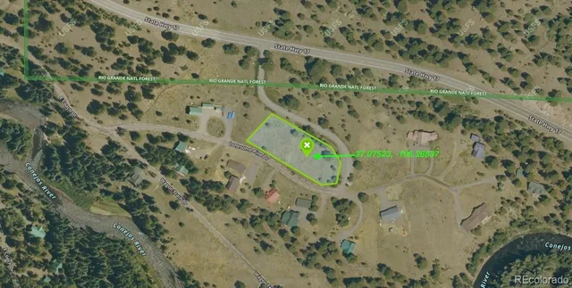 a view of a yard covered in snow