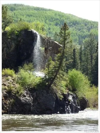 a view of a backyard of a house