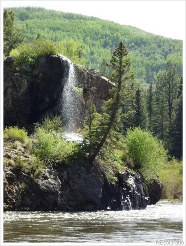 a view of a backyard of a house
