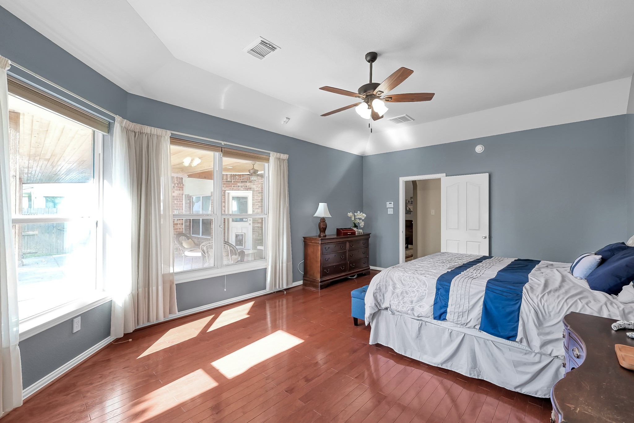 14730 Ramblebrook Humble, TX 77396 - Photo 21 of 48 a spacious bedroom with a large bed and a large window