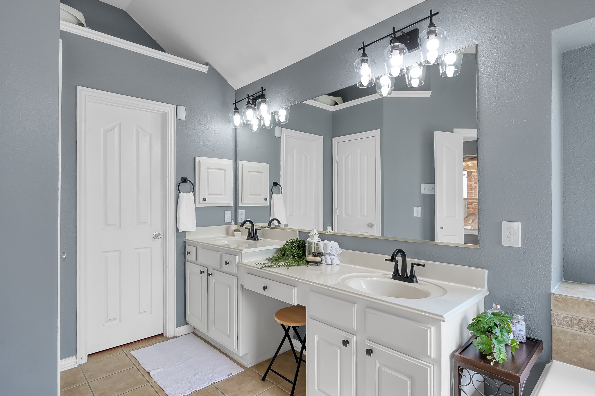 14730 Ramblebrook Humble, TX 77396 - Photo 22 of 48 a bathroom with a sink double vanity and a mirror