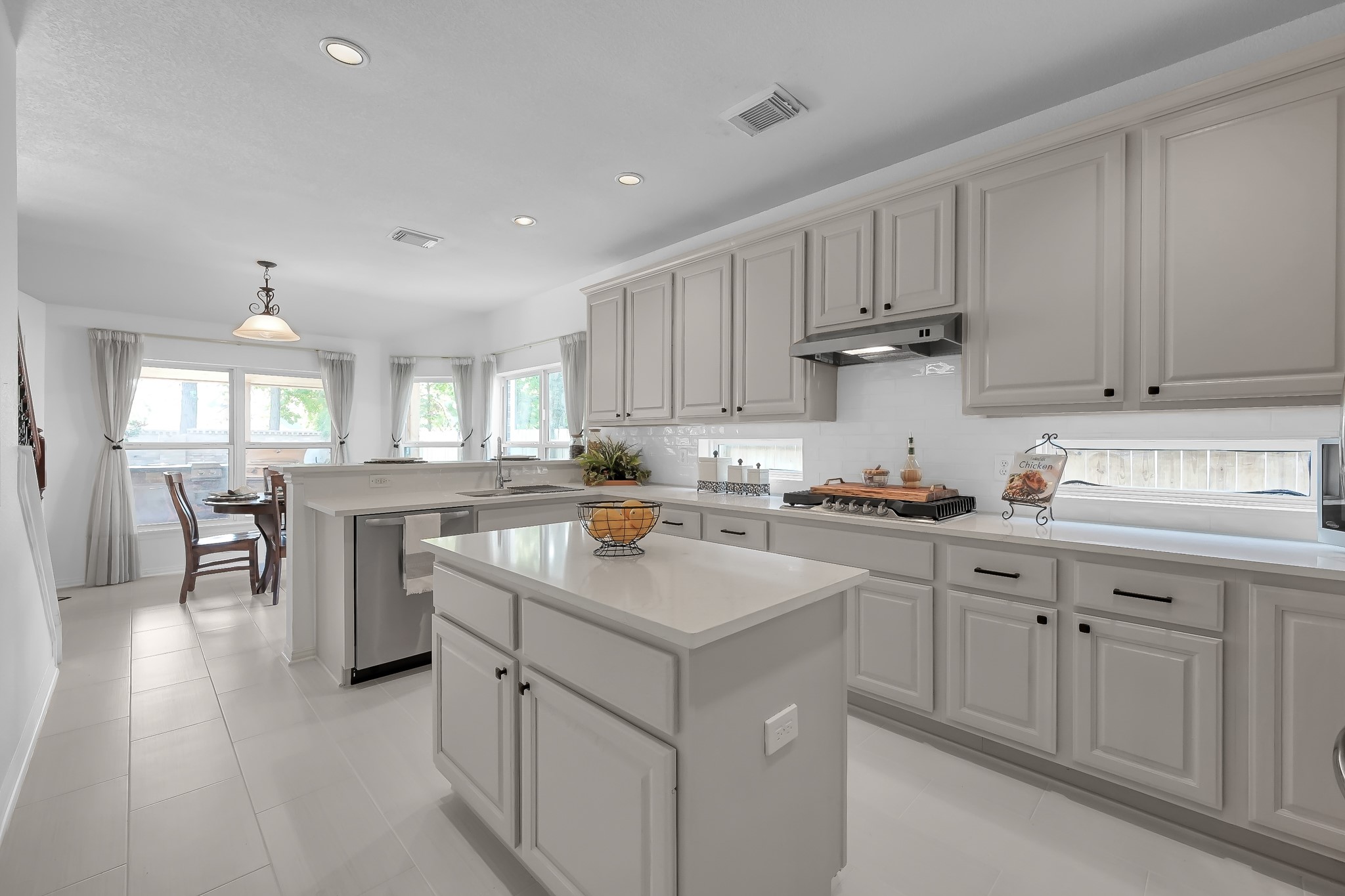 14730 Ramblebrook Humble, TX 77396 - Photo 3 of 48 a kitchen with a sink stove and cabinets