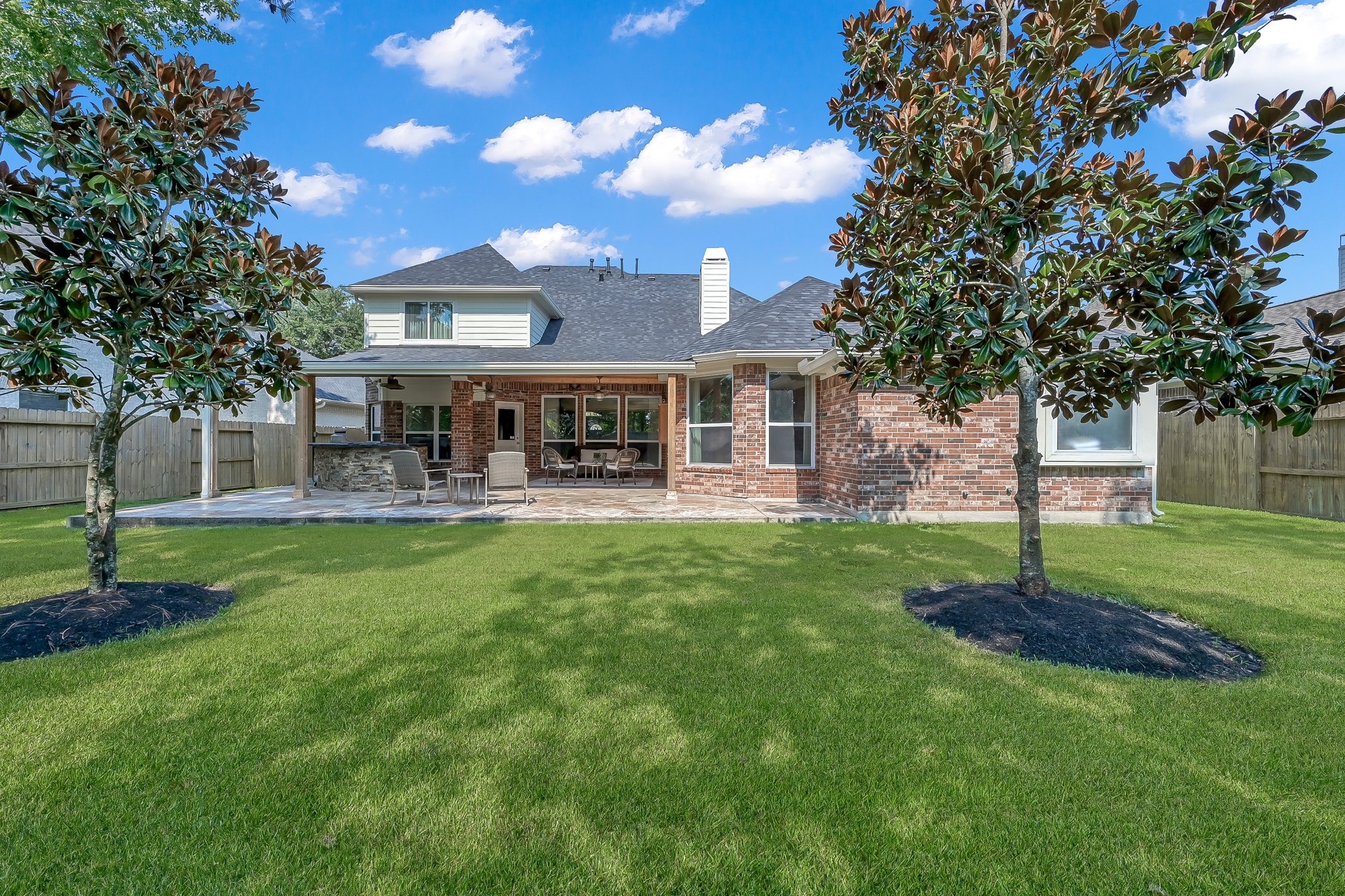 14730 Ramblebrook Humble, TX 77396 - Photo 7 of 48 a view of a house with a yard deck and a large tree