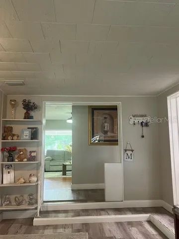 a view of a hallway with closet