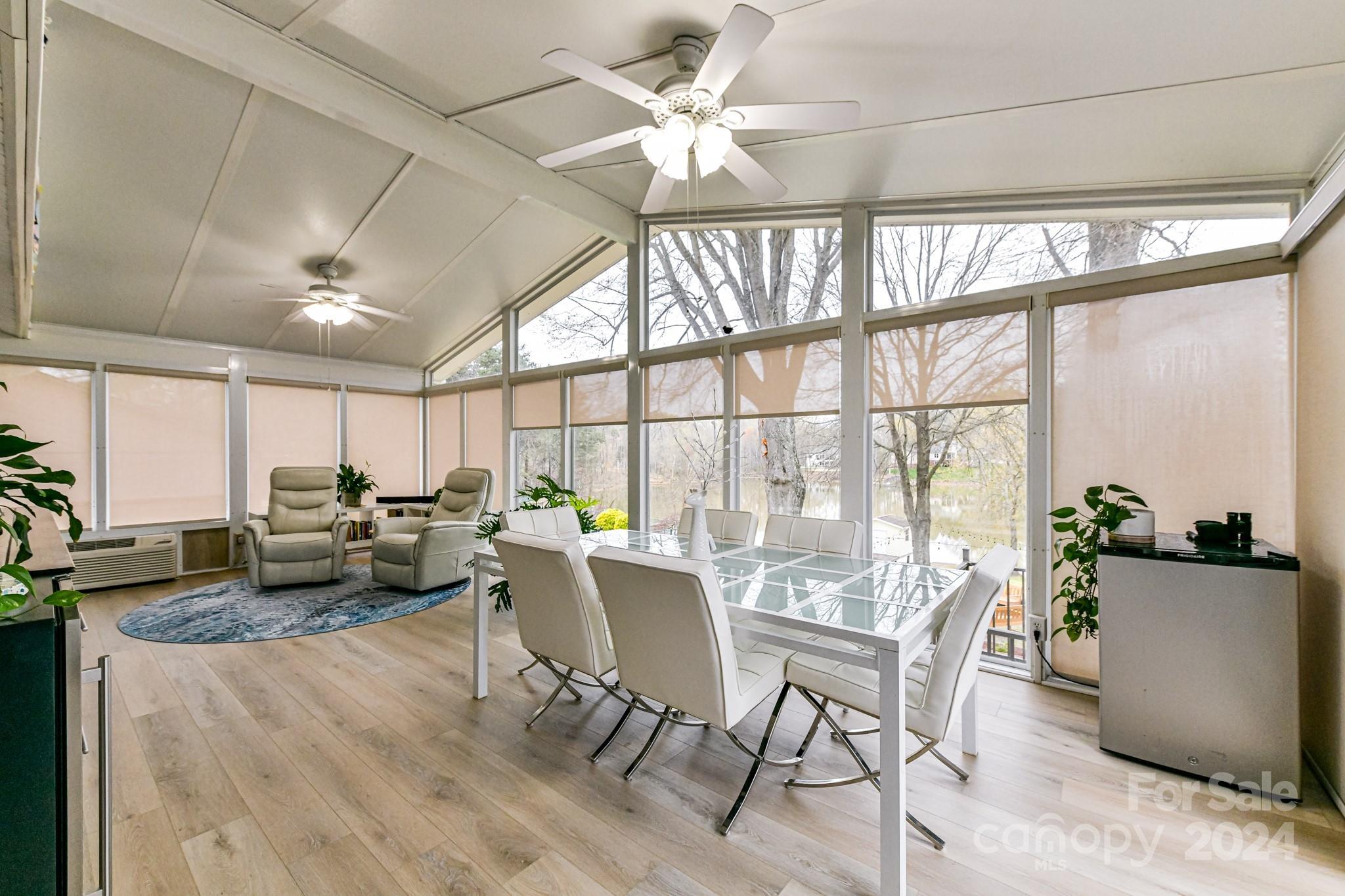 334 Ervin Road Mooresville, NC 28117 - Photo 16 of 48 a view of a dining room with furniture window and outside view
