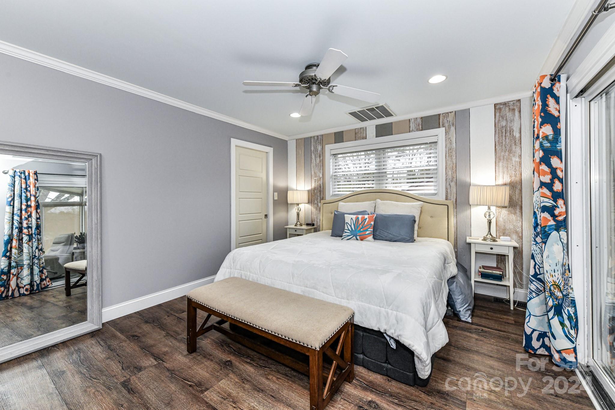 334 Ervin Road Mooresville, NC 28117 - Photo 18 of 48 a bedroom with a bed table and a window