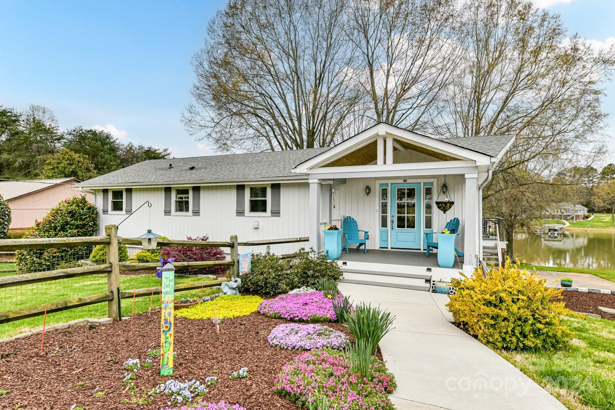334 Ervin Road Mooresville, NC 28117 - Photo 2 of 48 a front view of a house with garden