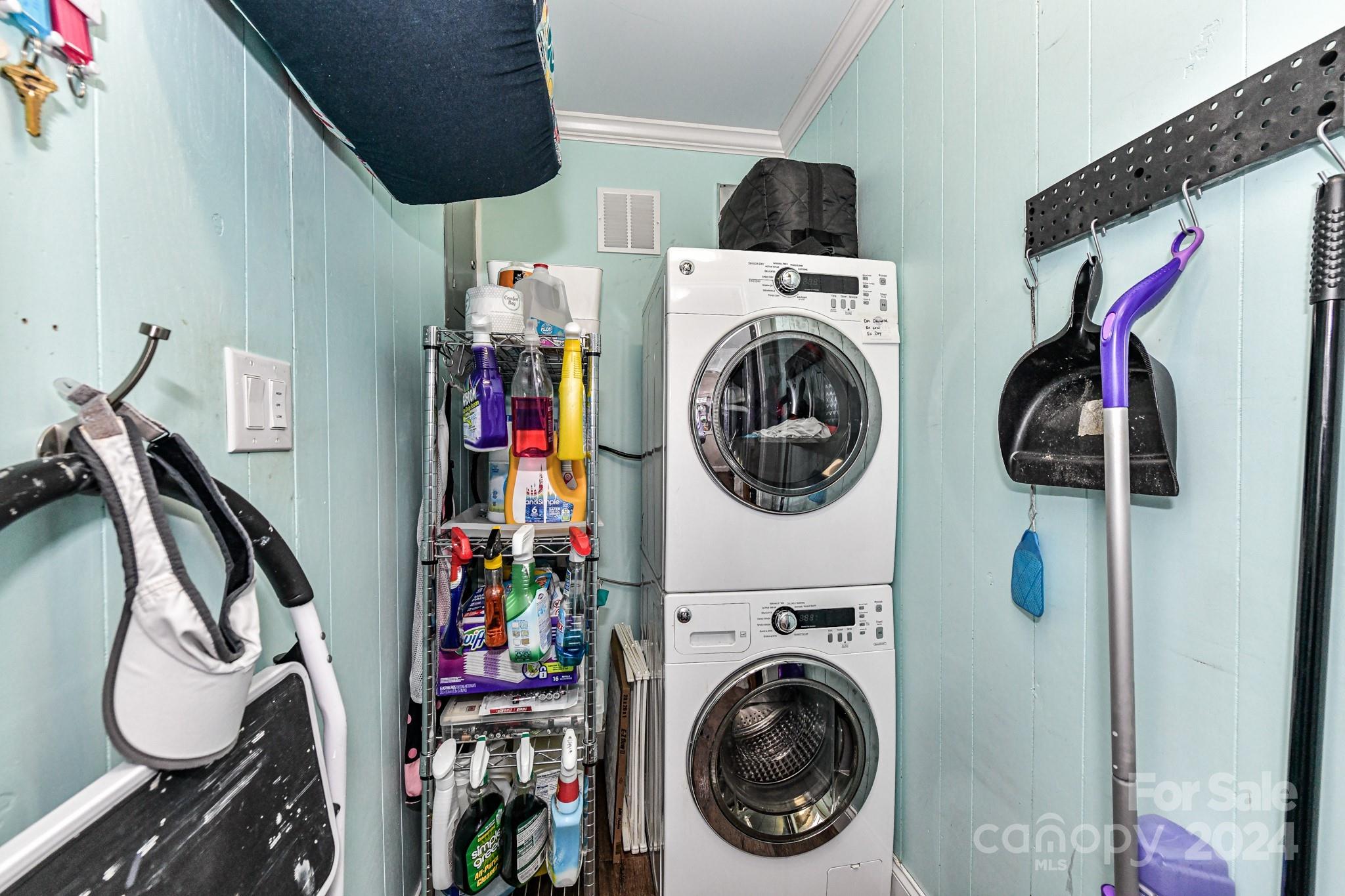 334 Ervin Road Mooresville, NC 28117 - Photo 21 of 48 a view of a storage and utility room with washer and dryer