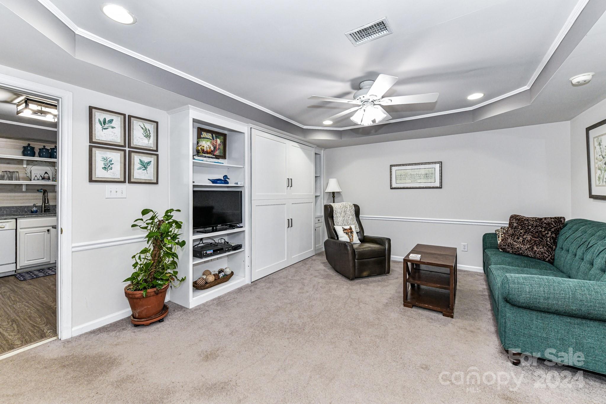 334 Ervin Road Mooresville, NC 28117 - Photo 23 of 48 a living room with furniture kitchen and a window