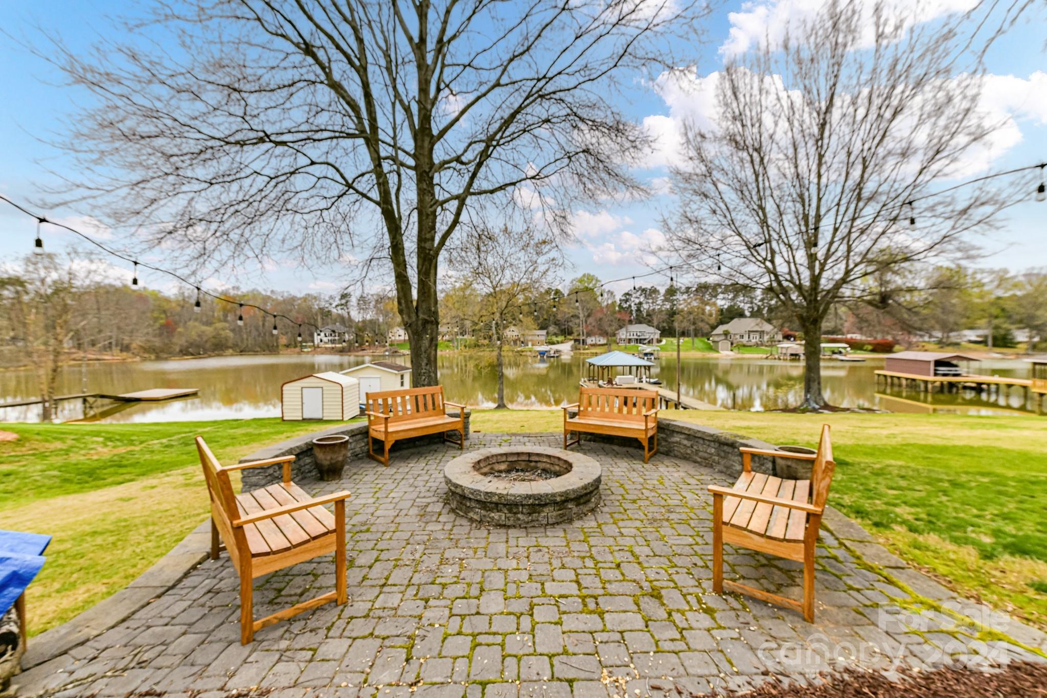 334 Ervin Road Mooresville, NC 28117 - Photo 42 of 48 a view of a swimming pool with a lounge chairs