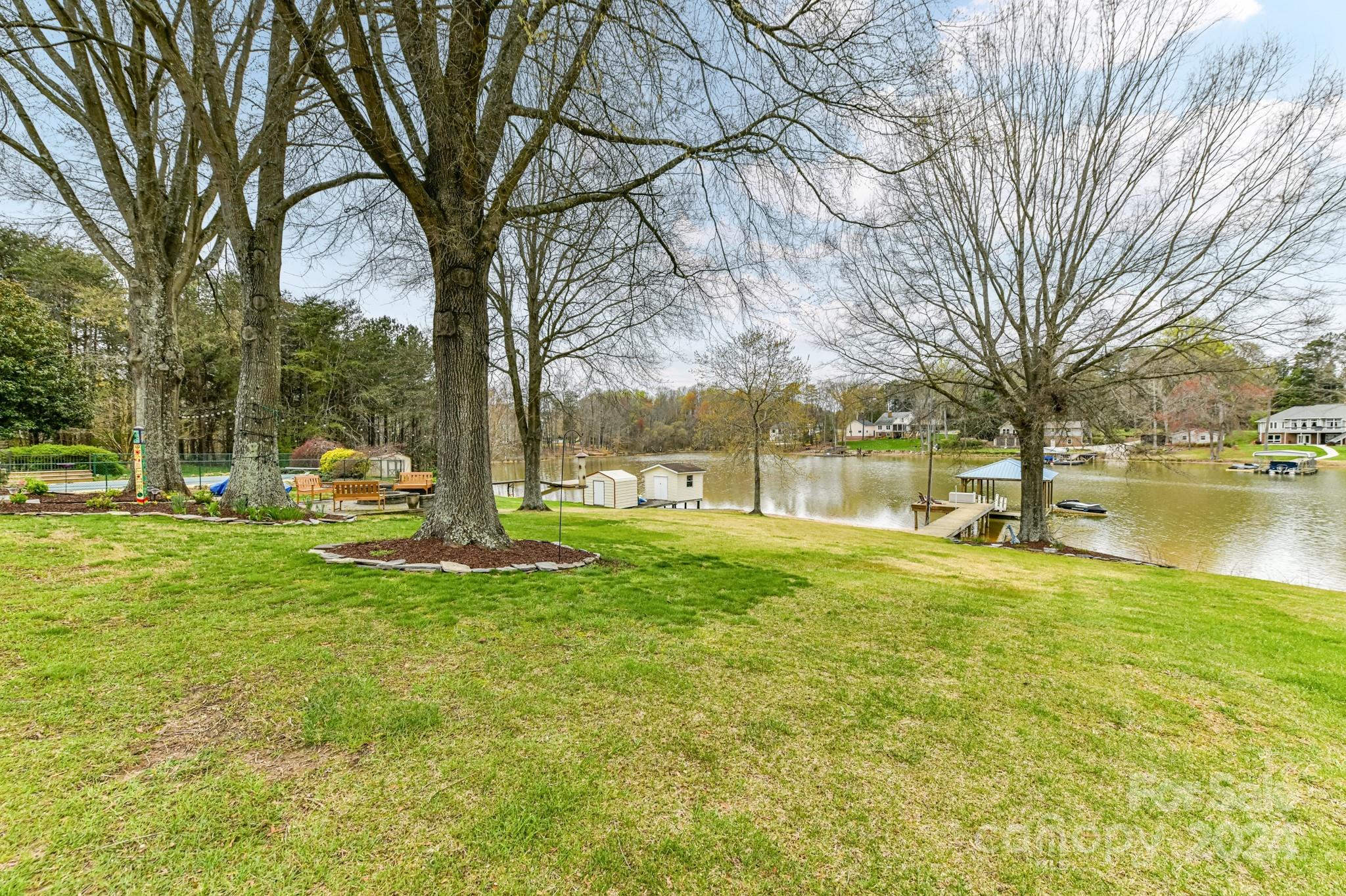 334 Ervin Road Mooresville, NC 28117 - Photo 44 of 48 a view of yard with swimming pool and green space