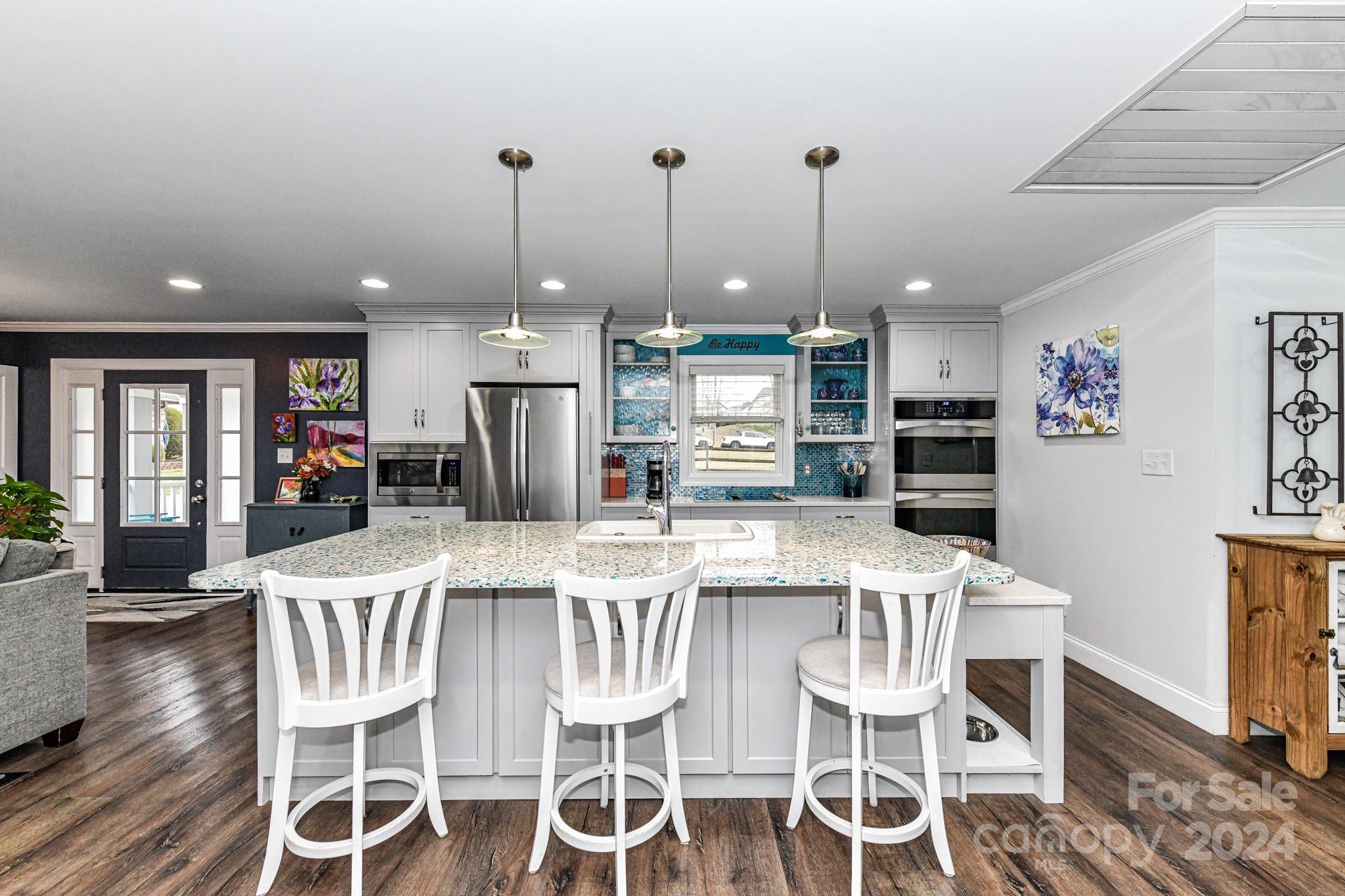 334 Ervin Road Mooresville, NC 28117 - Photo 10 of 48 a view of a dining room with furniture