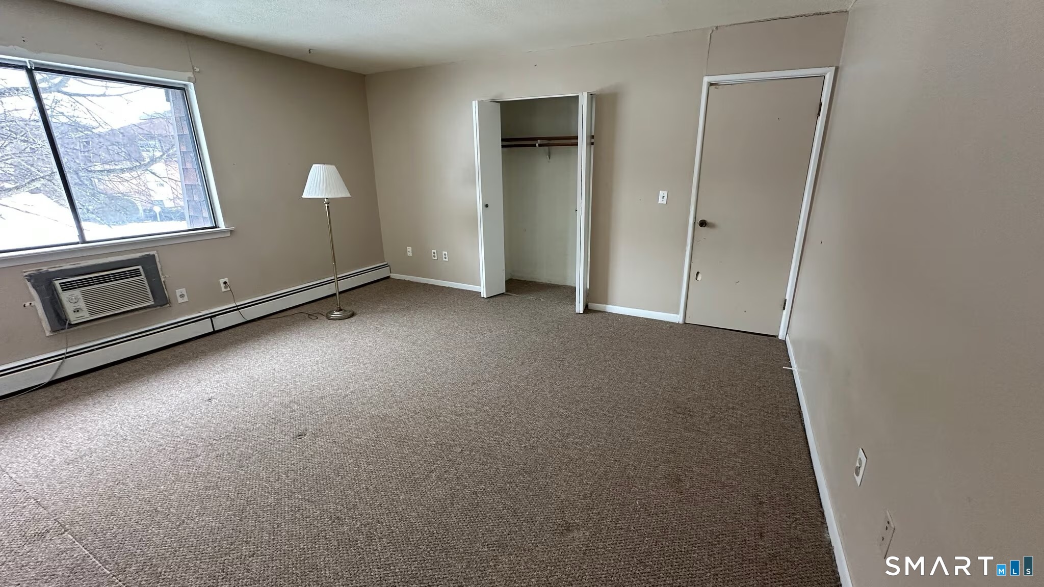 581 Crown Street, Unit 99 Meriden, CT 06450 - Photo 6 of 10 a view of empty room with window