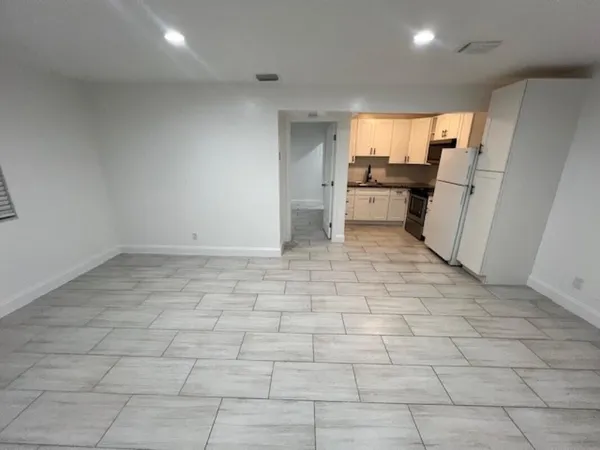 a view of a kitchen with a sink