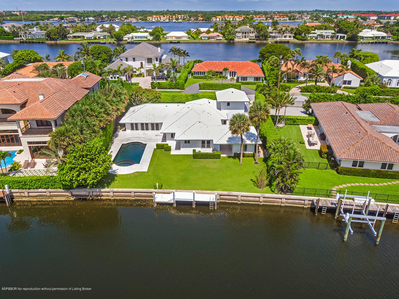 75 Spoonbill Road Manalapan, FL 33462 - Photo 2 of 41 an aerial view of a house with a lake view