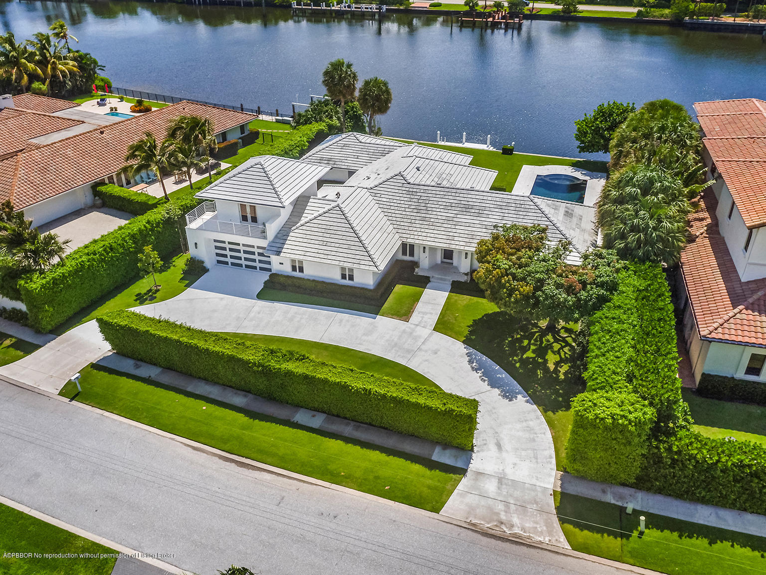 75 Spoonbill Road Manalapan, FL 33462 - Photo 24 of 41 an aerial view of a house with a lake view