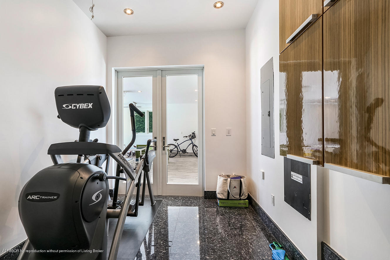 75 Spoonbill Road Manalapan, FL 33462 - Photo 34 of 41 a view of a hallway with workspace