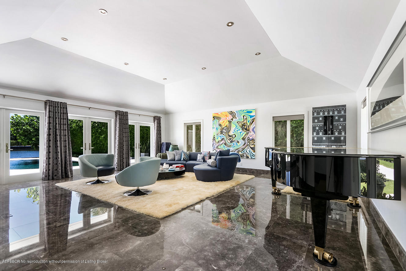 75 Spoonbill Road Manalapan, FL 33462 - Photo 5 of 41 a view of a livingroom with furniture window and outside view