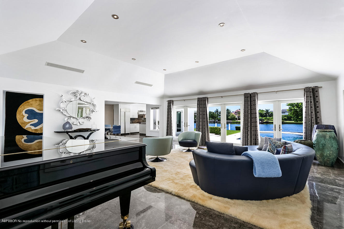 75 Spoonbill Road Manalapan, FL 33462 - Photo 6 of 41 a living room with furniture and a large window