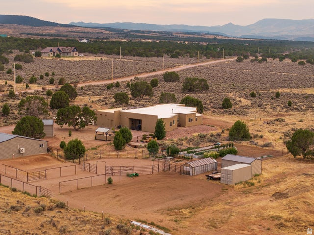 2925 Juniper Road Enterprise, UT 84725 - Photo 48 of 56 Aerial view at dusk of a mountain view, a view of countryside, and view of desert