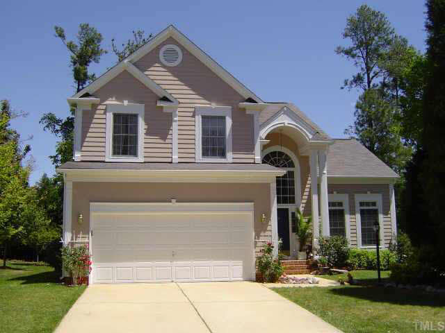 9016 Breeland Way Raleigh, NC 27613 - Photo 1 of 10 a front view of a house with garden