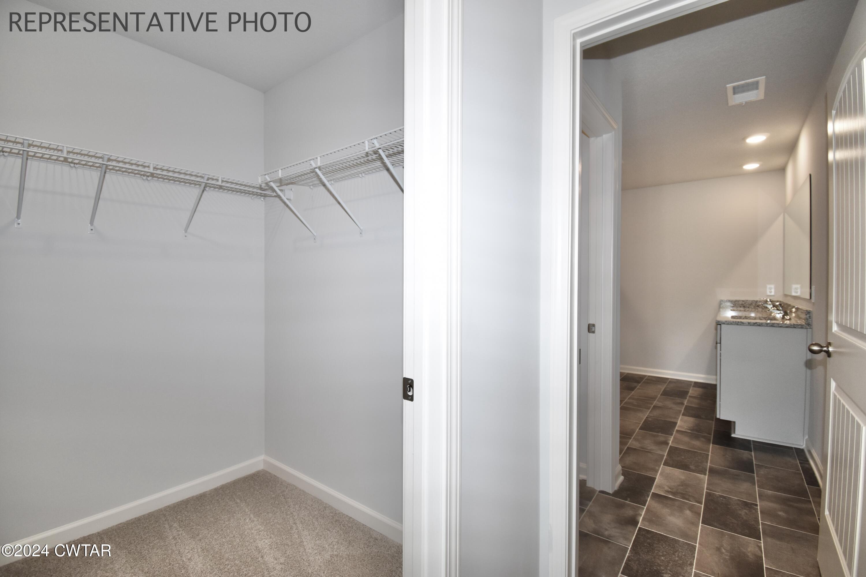 61 Vintage Grove Road Jackson, TN 38305 - Photo 16 of 25 a bathroom with a sink and a shower