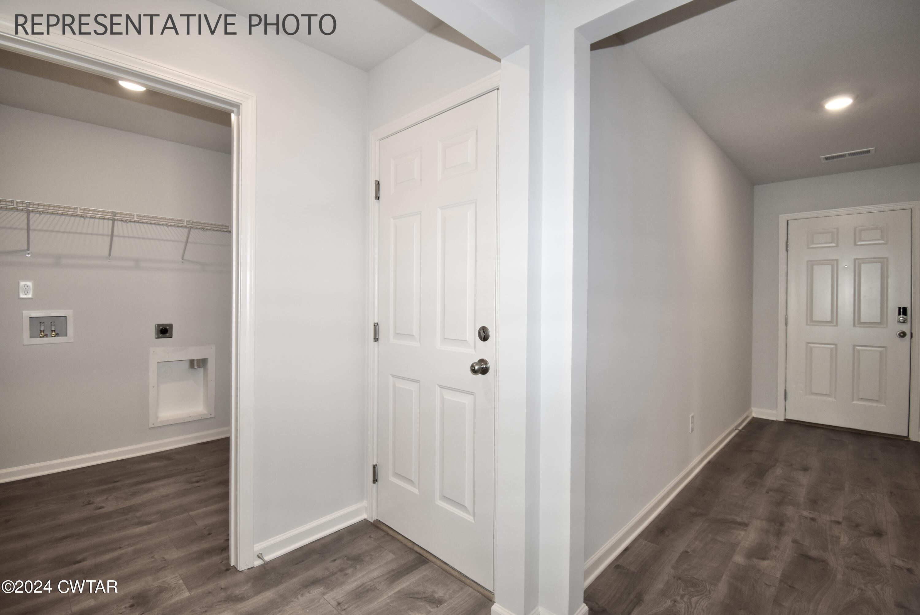 61 Vintage Grove Road Jackson, TN 38305 - Photo 24 of 25 a view of a hallway with wooden floor