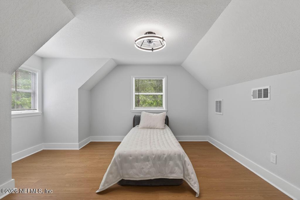 43739 Ratliff Road Callahan, FL 32011 - Photo 49 of 55 a bedroom with a bed and a window