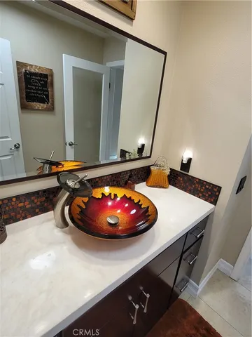 a room with furniture and wooden floor