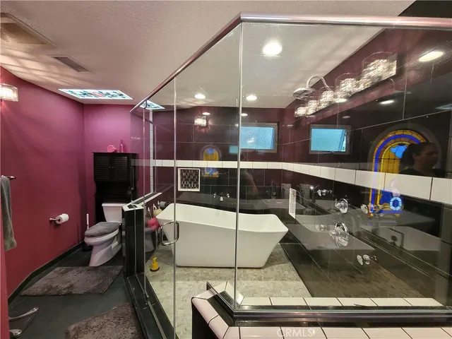 a room with lots of furniture and clutter