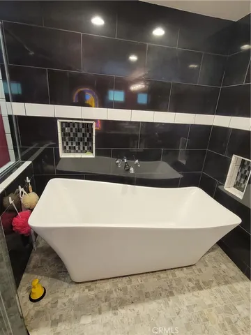 a bathroom with a bathtub