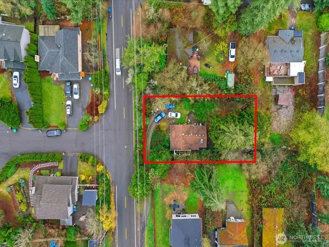 an aerial view of a houses with outdoor space