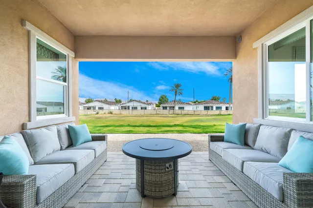 a living room with furniture and a couch