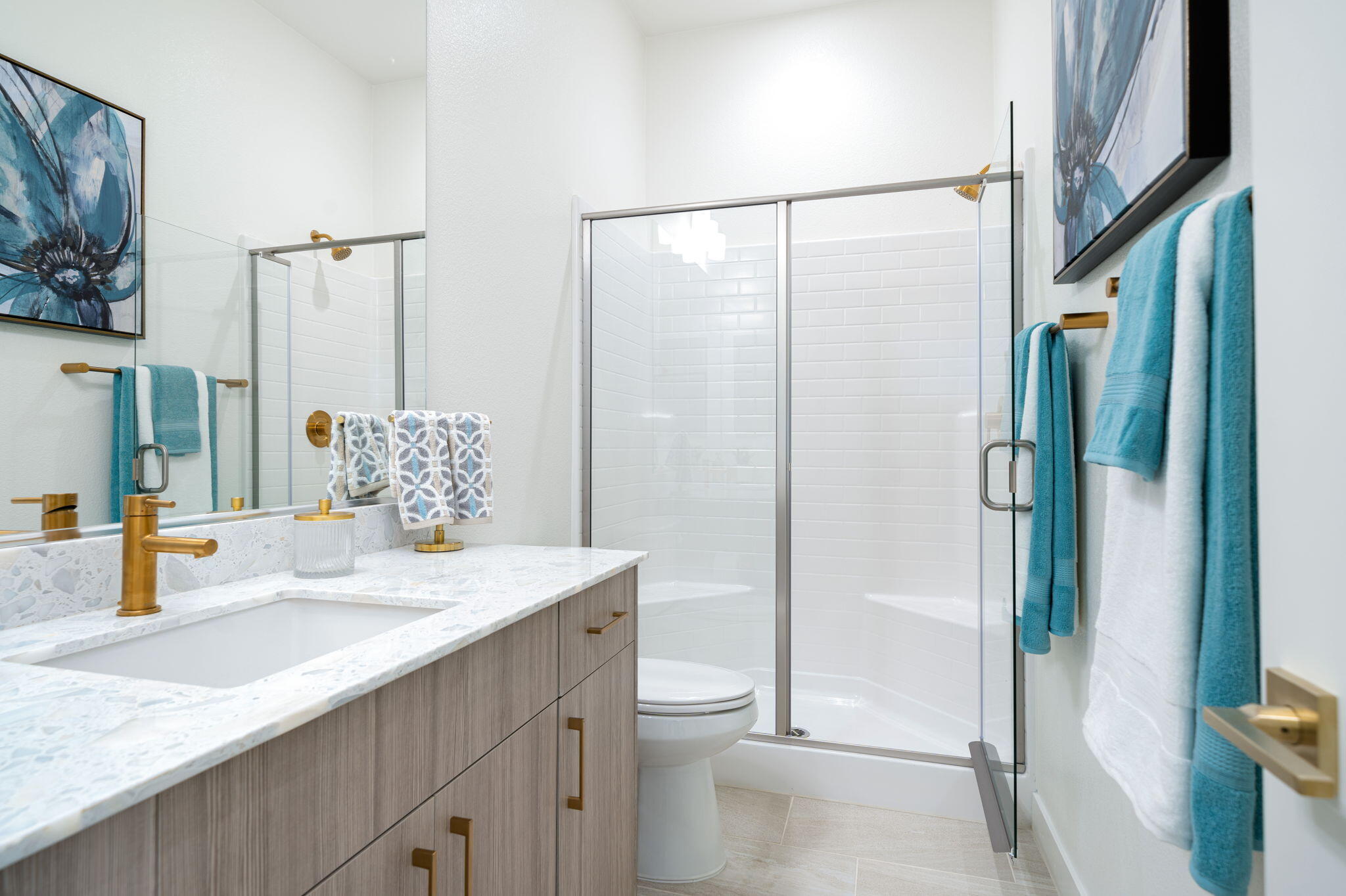 82725 Ryan Way Indio, CA 92201 - Photo 28 of 31 a bathroom with a granite countertop sink toilet and shower