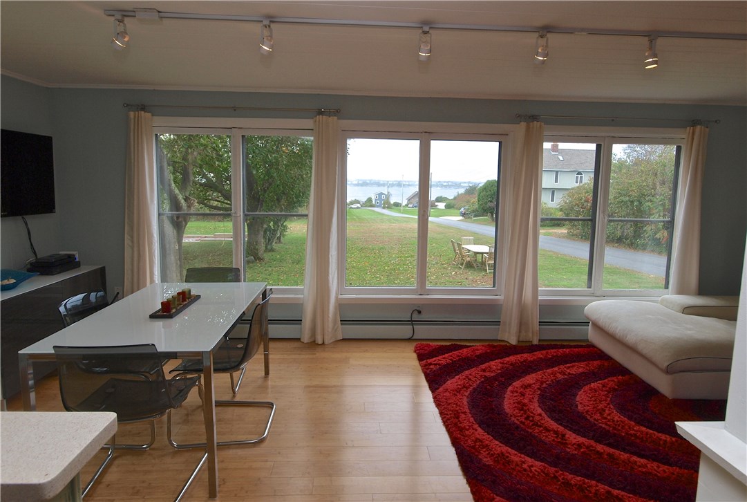 29 Bayberry Road Jamestown, RI 02835 - Photo 8 of 22 Dining Area and Sitting Area is 12 x 23, perfect for watching sunsets!
