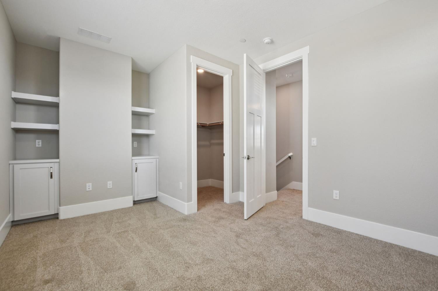 3016 Pocosol Way Rancho Cordova, CA 95742 - Photo 22 of 37 an empty room with closet and windows