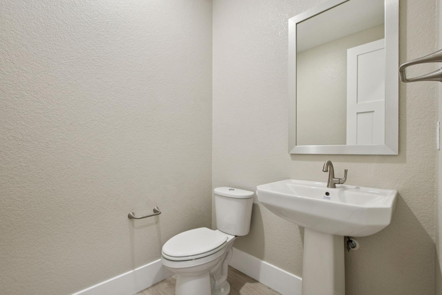 3016 Pocosol Way Rancho Cordova, CA 95742 - Photo 28 of 37 a bathroom with a sink and a toilet
